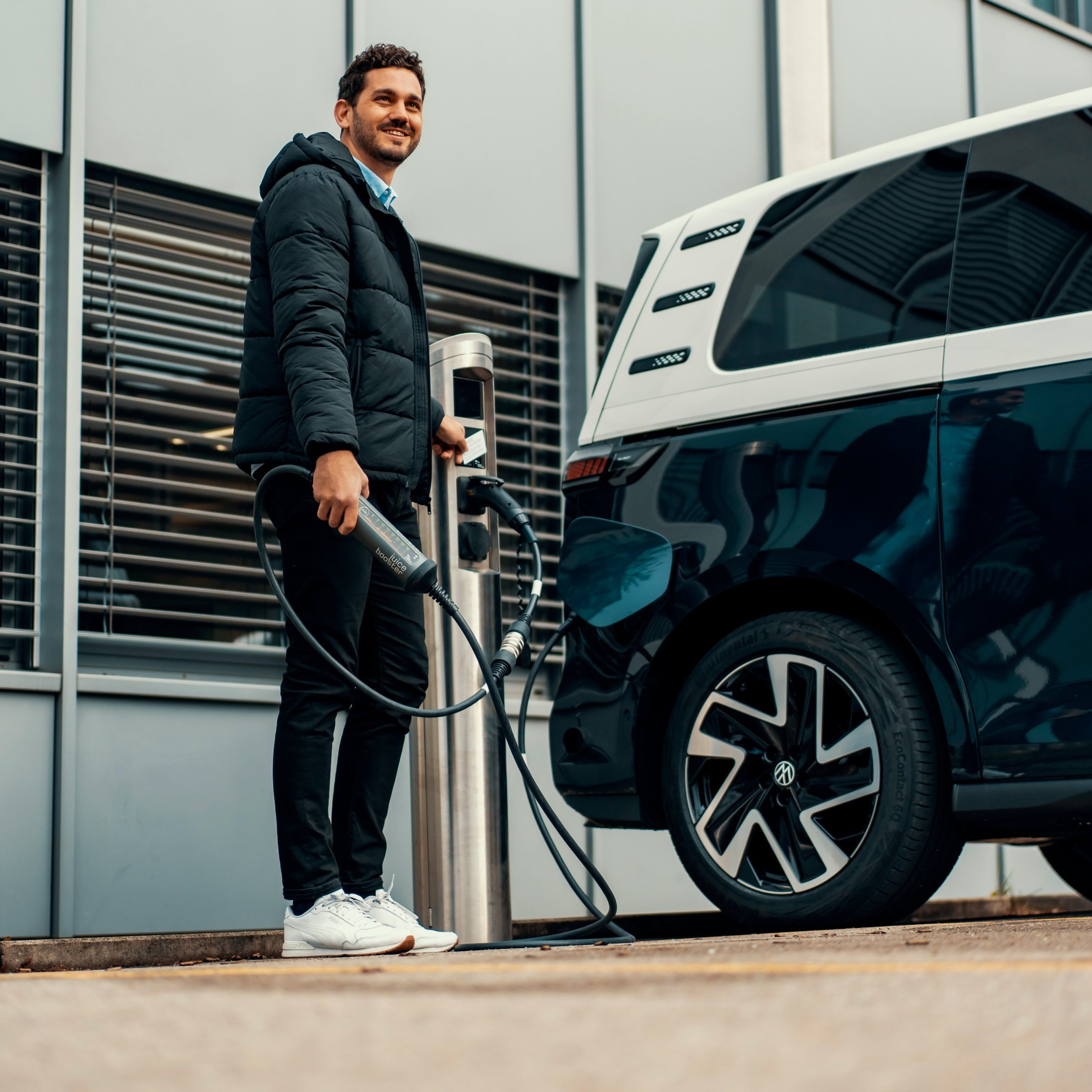 Person charging an EV.